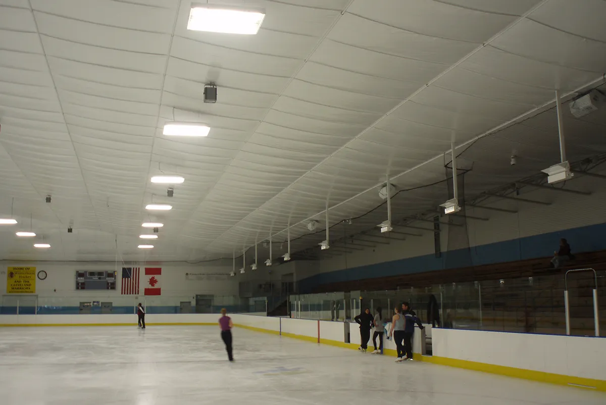 Insulated ice arena ceiling and walls
